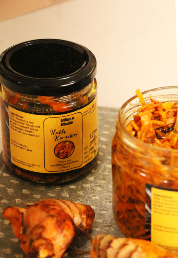 Pickle made from fresh turmeric roots. Health Benefits: Known for its anti-inflammatory properties.